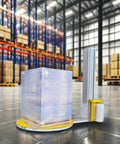Built Like A Tank Automatic Pallet Wrapper With Plc Touchscreen Panel And Heavy Duty Welded Steel Frame To Crush Daily Freight Loads Without Skipping A Beat On High Volume Shipping Floors in a warehouse with a pallet.