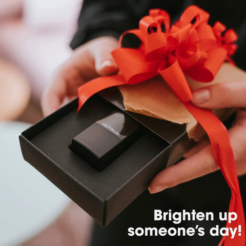 Gift-wrapped Rechargeable Reading Light Clip On For Glasses Or Headphones With LED Book Light in black box and red ribbon