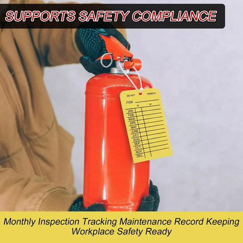 Yellow Must-Have Fire Extinguisher Monthly Inspection Tags attached to a red extinguisher, showing calendar lines, 4 by 2.5 inch size.