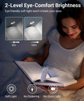 Woman reading in bed with Clip On Book Light With USB Rechargeable Power, Eye Friendly White LED Reading Lamp, showing brightness levels.