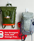Extra Large Heavyweight Wall Hooks With Adhesive Strips holding backpacks, ideal for damage-free hanging up to 15 lb each