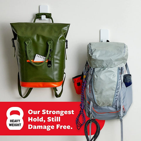 Extra Large Heavyweight Wall Hooks With Adhesive Strips holding backpacks, ideal for damage-free hanging up to 15 lb each