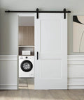 36 By 84 Inch Sliding Barn Door Kit, White Primed Composite Interior Slab With 2 Panels in laundry room, installed view