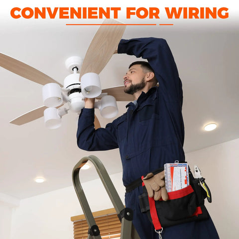 Electrician using 84-Piece Lever Wire Connectors Kit for wiring a ceiling fan, showcasing easy DIY runs.