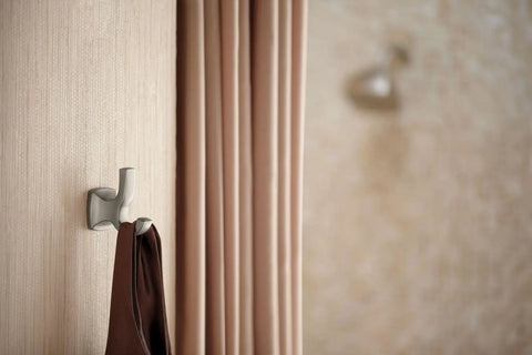 Brushed Nickel Double Robe Hook For Bathroom And Kitchen Walls A Durable Wall Mounted Metal Towel Hanger on beige wall with drape