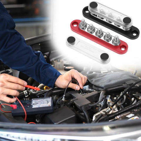 Top Shelf Mini Bus Bar Power Distribution Block 150A Tin Plated Copper 48V Dc 300V Ac Terminals for automotive use under a car hood.