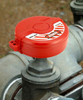 Gate Valve Lockout For Two And A Quarter To Five Inch Valves Red Lockout Device Made From Non Conductive Plastic installed on valve
