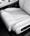 Ergonomic Mini John Cooper Works Electric Thigh Support Cushion With Soft Pu Leather Leg Rest Pad For Car Seat Extension And Comfortable Driving Ride, white PU leather close-up.
