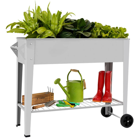 Raised Garden Bed Outdoor Planter Box On Wheels With Sturdy Legs For Vegetables Flowers Tomatoes And Herbs Patio Backyard Heavy Duty 400 Lbs Rustproof Powder Coated Steel Easily Movable Space Saving Garden System with green plants.