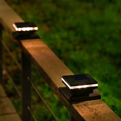 Solar Post Lights 15 Lumen Outdoor Cap Lights For Fence Deck Or Patio Warm White LED Solar Powered Caps on wood posts