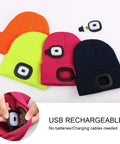 Hands Free LED Beanie With USB Rechargeable Headlamp For Kids Unisex Winter Knit Cap Lighted Hat Navy Blue Perfect For Camping Running Walking Night Safety And Fun Gifts displayed with different colors, showing removable headlamp.