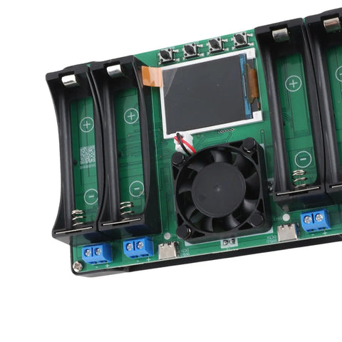 Straight Up Battery Diagnostics With This 4 Channel Capacity Tester Module Featuring Integrated Charge Discharge Functions For Li Ion Li Po Cells display with battery slots, cooling fan, and control buttons on a green PCB.