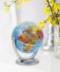 Dope Rotating World Globe With Stand For Adults Educational Decorative Tellurian Ball Smooth Spin Geography Globe For Classroom Home Office Desk Ornament Blue Tabletop Decor with yellow flowers nearby
