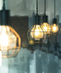 Hanging pendant lights with LED Edison Vintage Vanity Globe Bulbs G25 4W Dimmable, warm white glow.