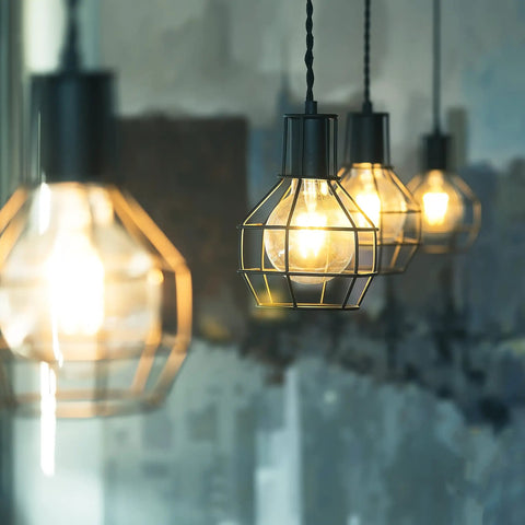 Hanging pendant lights with LED Edison Vintage Vanity Globe Bulbs G25 4W Dimmable, warm white glow.