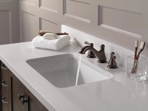 Bathroom sink featuring Haywood Widespread Chrome Bathroom Faucet For 3-Hole Sinks Fits 6 To 16 Inch Wide Setups With Durable Chrome Finish Includes Drain Assembly Lifetime Limited Warranty Easy Install Drip Free Performance.
