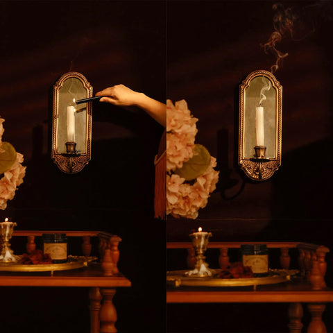 Vintage Gold Wall Mounted Candle Sconce With Mirrored Backplate And Floral 3D Woven Texture For Bathroom Or Living Room Certified Prime Real Estate Home Decor Accessory That Elevates Your Daily Vibes Always lit with candle in elegant setting.