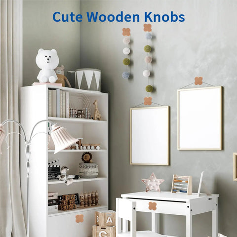 Top Shelf Four Leaf Wooden Drawer Knobs Pack Of Twelve Heavy Duty Natural Beech Wood Cabinet Pulls With Screws on a white cabinet.