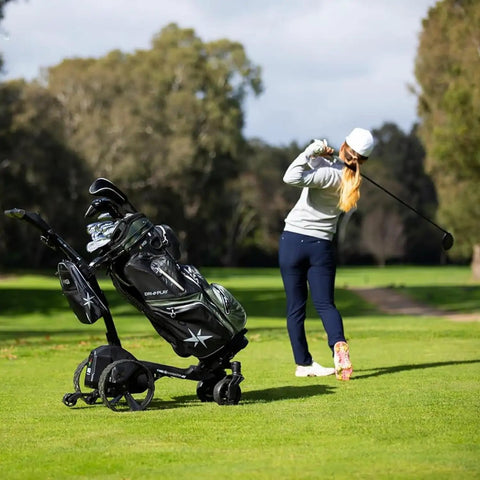 No Drama All Terrain Remote Electric Golf Cart With Full Zip Folding Frame Plays Thirty Six Holes Smooth Operator on grassy course.