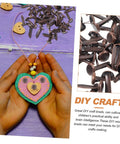 Hands holding a heart craft with Fifty Piece Double Foot Spikes Metal Brads For Scrapbooking And DIY Crafts Durable Paper Fasteners