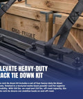 Close-up of black cleat from Rack Tie Down Kit For T Slot Rails Four Pack With Beefy Cleats And Adjustable Bases on truck bed