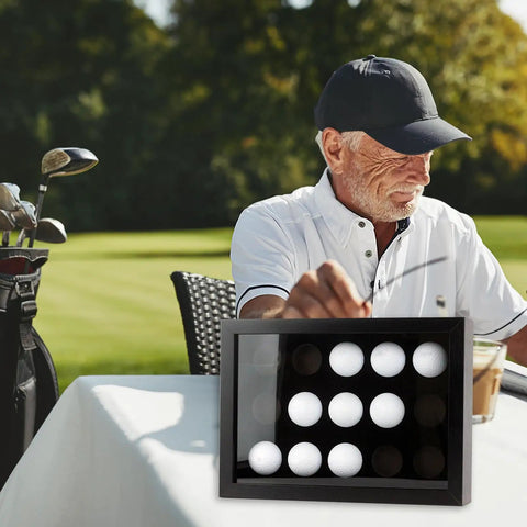 Man by golf course with Golf Ball Display Case With EVA Foam Protection Wall Mount Or Desktop Shadow Box in foreground