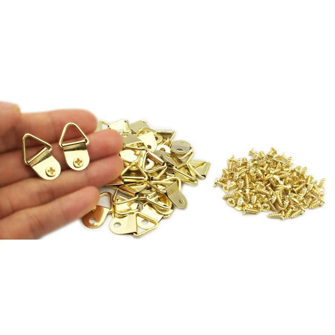 100 Pack Small Triangle Ring Steel Picture Hangers With Screws Gold Finish For Picture Frames And Artwork Hangin Photos Clocks Paintings Durable Rustproof Easy To Install And Secure shown in hand with screws