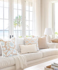 Coastal Lumbar Pillow Cover 12x20 Inches, Water-Repellent Indoor Outdoor, Scalloped Edge, Neutral Tan Stripe Pattern on couch