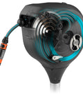 Close-up of Automatic Retractable Garden Hose Reel With 50 Feet Of Easy Retracting Hose 360 Degree Swivel Metal Spike Base UV