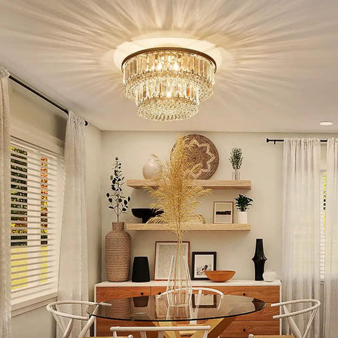 K9 Crystal 3-Light Two-Tier Flush Mount Ceiling Light Fixture, Sleek Modern Chandelier For Bedroom, Dining Room, Living Room, LED Compatible, 9-Inch H X 10-Inch Dia elegantly illuminates a stylish dining room.