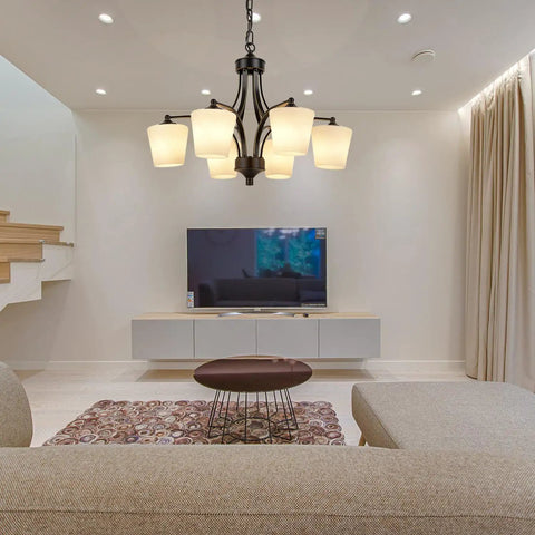 Six Light Large Chandelier With Alabaster Glass Shades In Oil Rubbed Bronze Finish hanging in modern living room