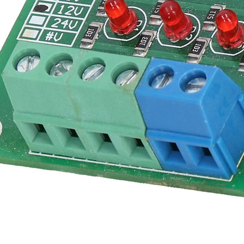 Close-up of terminal blocks and LEDs on Optocoupler Isolation Board 24V To 5V PLC Level Voltage Converter Module Four Channel.