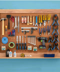 16 Piece Pliers And Drivers Pegboard Hook Set With Heavy Duty Hooks And Screwdriver Rings on garage pegboard.
