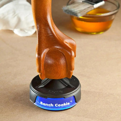 Bench Cookies Finishing Cones 4 Pack For Woodworking Snug Fit Over Work Grippers in use with wood and brush nearby