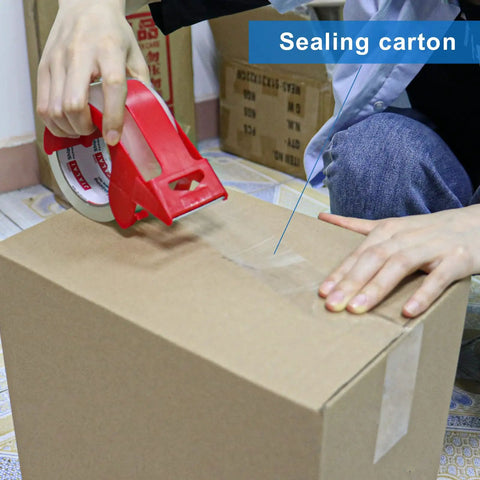 Person using Heavy Duty Clear Packing Tape Kit With Refillable Dispenser Tough As Nails Industrial Grade Packaging Tape for moving.