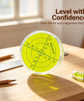 Magnetic Round Bubble Level Tool Bullseye Inclinometer Machinist on wooden surface with clear measurement grid for alignment.
