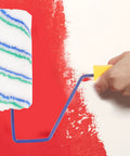 Portable Handheld Paint Roller With Removable Handle For Walls Ceilings And Furniture Lightweight Build, applying red paint with foam cover.
