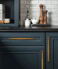 Dark kitchen cabinet with 2 Pack 3-1/2 Inch Center to Center Antique Brass Cabinet Pulls, solid heavy-duty hardware in durable aluminum or stainless steel.