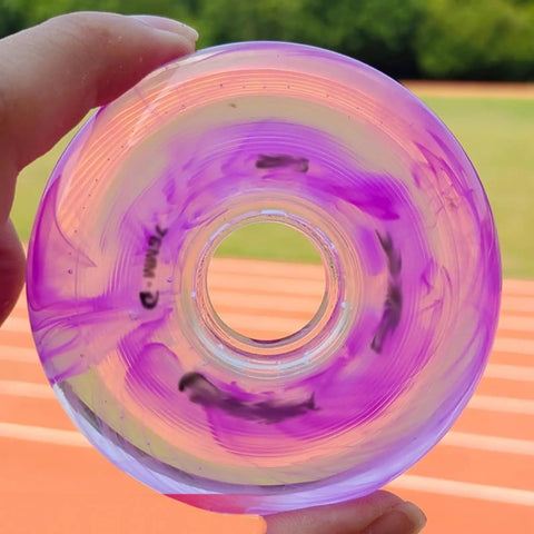 Close-up of a purple transparent inline skate wheel from Inline Skate Wheel Replacement Set 83A 72Mm 76Mm 80Mm Durable PU Wheels.