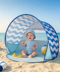 Baby sitting inside a Pop Up Baby Beach Tent With UPF 50+ Canopy, Portable Sun Shade For Infants And Toddlers, Wind Resistant Base