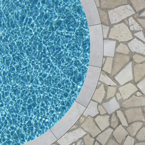 Bird's-eye view of a round pool with Waterborne Semi Gloss Acrylic Pool Paint Ocean Blue 1 Gallon DIY Friendly For Fresh Or Saltwater Pools Quick Drying Lasting Color Protective Finish Over Properly Prepped Surfaces, adjacent to stone tile deck.