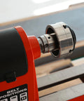 Side view of metal 1x8 TPI to 1-1/4x8 TPI thread adaptor with jackscrews for woodworking lathe headstock.