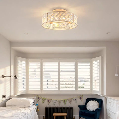 20" Flush Mount Caged Ceiling Fan with Remote, Retro White Floral Iron Low Profile Fan Light Fixture in a bright bedroom.