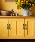 Yellow cabinet with Six Pack Bronze Leaf Shape Drawer Pulls With Three Inch Center For Vintage Style Cabinets Retro Vibe 4.72 Inch Length