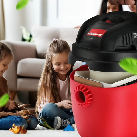 1.5-Gallon All Around Collection Bag 6 Pack for Small Vacuums in a home setting with children playing nearby