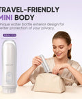 Woman placing Cordless Handheld Travel Bidet Sprayer With Two Pressure Modes Waterproof Foldable Pocket Size Portable Cleanse For Bathroom Home Or Camping No More Rough Toilet Paper Alloy Filter For Blockage Prevention Automatic Decompression Film Upgrade into beige bag