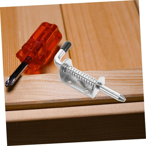 Heavy Duty Spring Loaded Latch Kit 2 Pcs Thickened Iron Safety Pins for cabinets with a screwdriver on wood surface