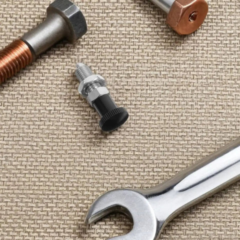 M10 Stainless Steel Reset Indexing Plunger Rock Solid Spring Locking Pin on workbench with tools