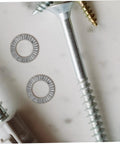 Built Tough Manganese Steel Wedge Locking Washers Heavy Duty Anti Loosening Hardware For Machinery And Construction close-up with screws