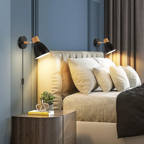 Plug In Swing Arm Wall Sconce Set Of Two Dope Black Bedside Reading Lamps With Cord And On Off Switch Adjustable Arm And Head Wall Mounted Lighting For Bedroom Hallway Modern Home Decor, installed above bed with cushions.